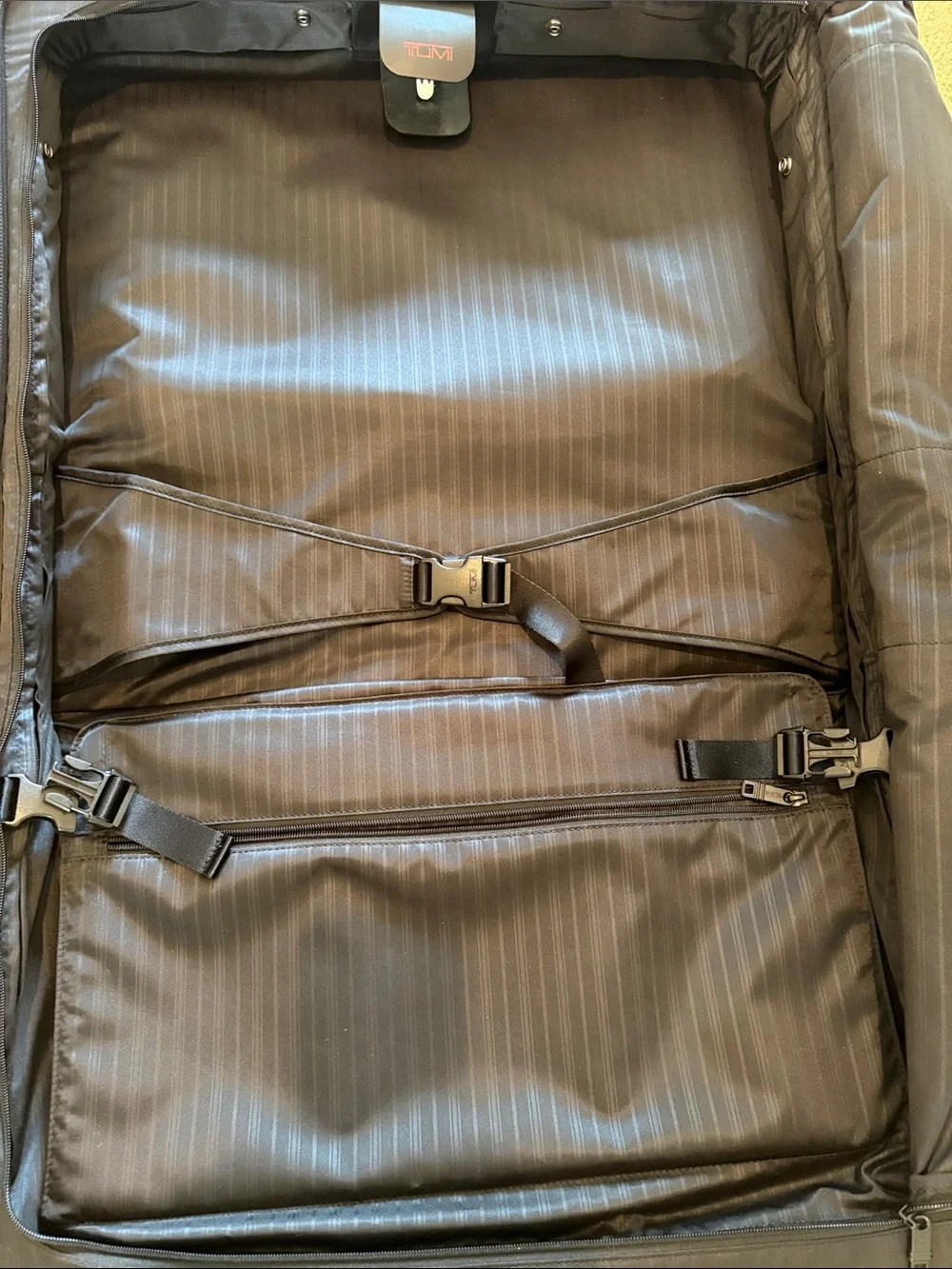 Tumi Black Fold-Open Garment Bag with Multiple Zip Pockets